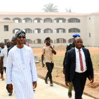   Governor State of Osun, Ogbeni Rauf Aregbesola and Exeternal  Electrical Engr. Oladele Babatunde during the unscheduled inspection  to the ongoing construction of Osogbo Government High School, Osogbo