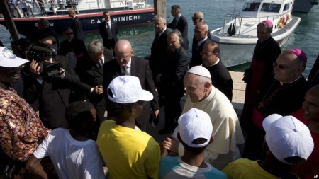 Pope Francis meets migrants at a detention center in Lesbos, Greece, April 16