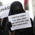 British Islamists protest outside the French Embassy in London