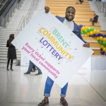 lateef with board smiling