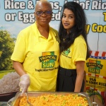 Wanis Trade Day – Tropical Sun Team Serving Jollof Rice