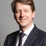 1200px-Official_portrait_of_Mr_Robin_Walker_MP_crop_2