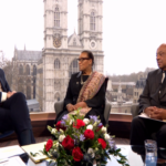 Fig 6 – Baroness Scotland and Lord Bateng paying tributes moments before the service