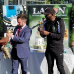 Councillor-Luke-Farley-handing-over-the-Winners-Trophy-to-the-Camerronian-Captain-