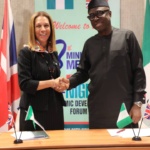 Handshake – UK PM Trade Envoy to Nigeria, Helen Grant and Honourable Minister, FMITI, Nigeria, Otunba Richard Adebayo