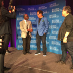 Prof Chris Imafidon on stage with legendary Dr Robert Kiyosaki