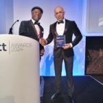 01 – Figure 1 Nick Madhavji, MBE of Joskos Solution receives the Outstanding Achievement Award